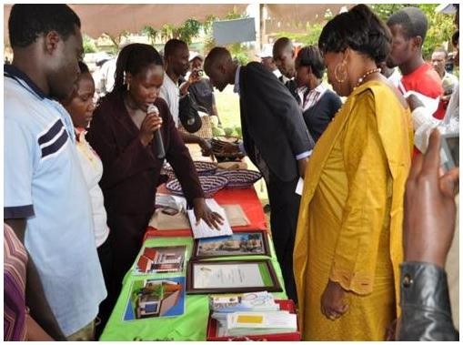 The PHCs displaying some of their proposed plans for their future houses during the World Habitat Day celebrations in October 2012